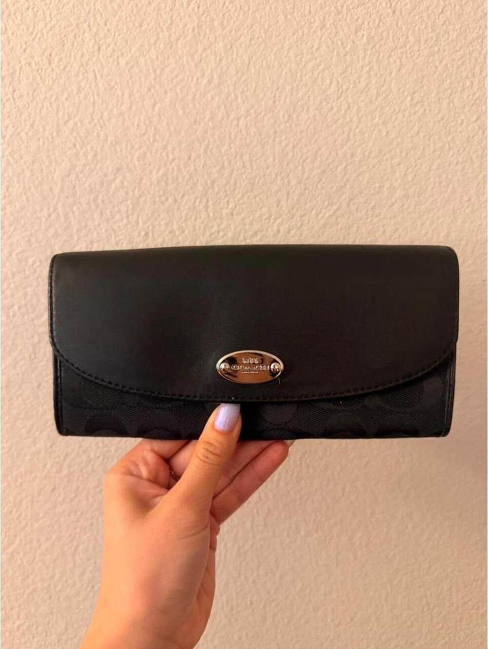 Black Coach Wallet with Silver Emblem